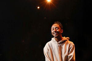 Student actor on stage