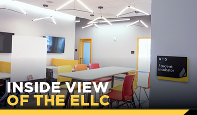interior photo of the ELLC building with bright lights and colorful seating text says inside view of the ellc