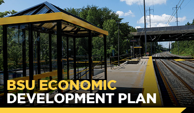 bench at train station. text: Economic Development Plan
