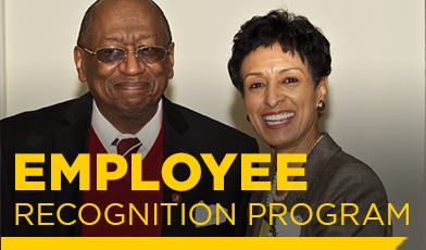 Man and woman smiling with Employee Recognition Program written over them