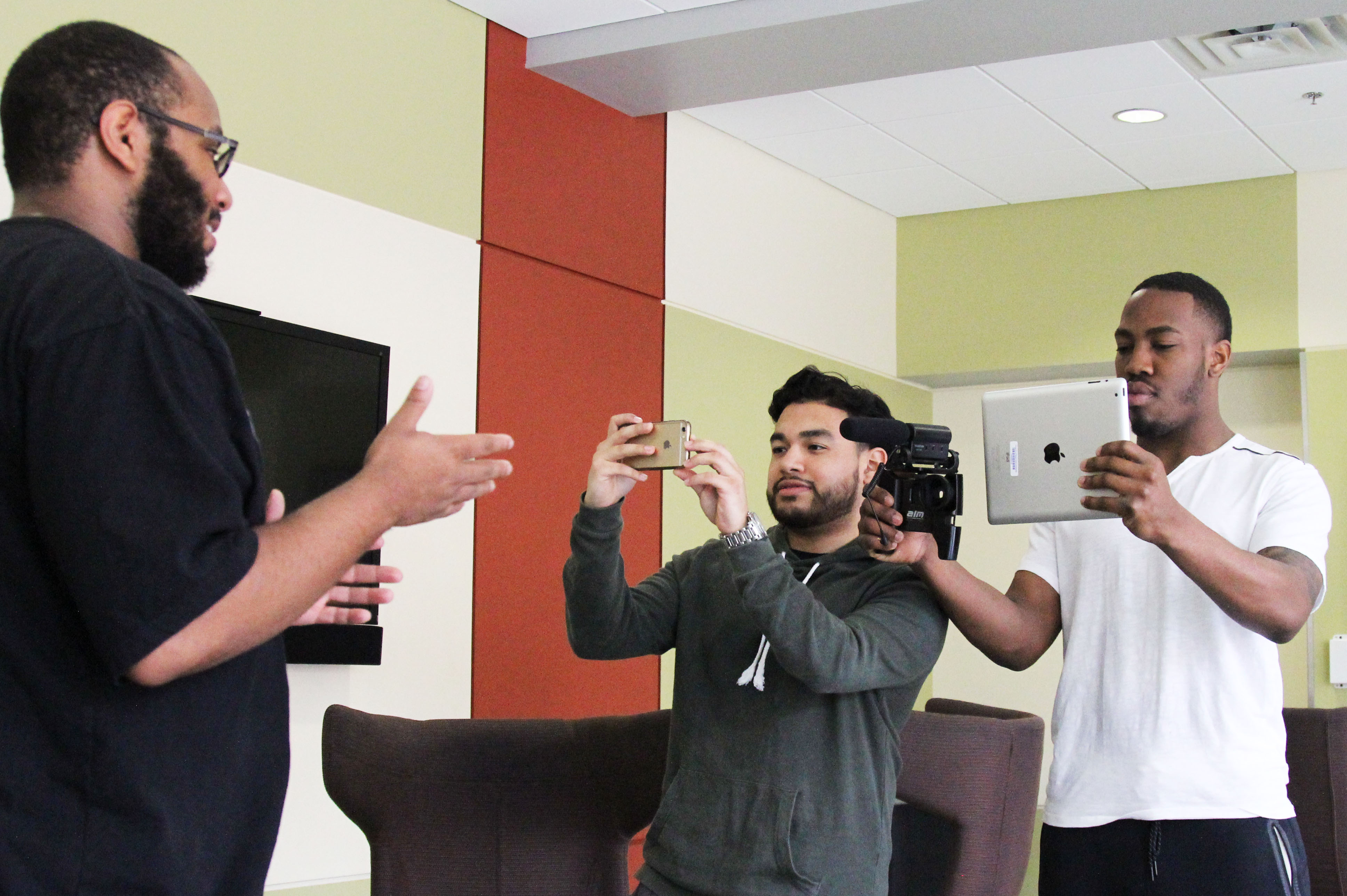 Mobile journalism student interns interview another student