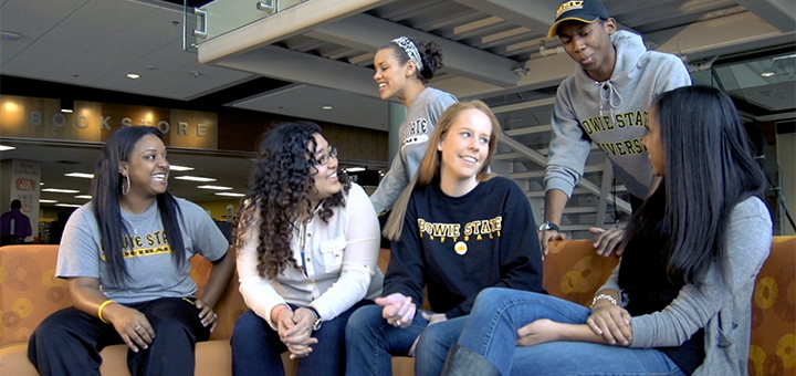 Group of students sitting and talking in the Student group at the Student Center at Bowie State University